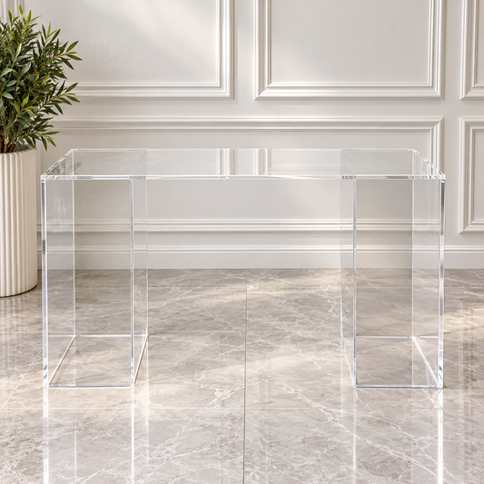 Clear acrylic display table with transparent rectangular tabletop and modern acrylic legs available for wedding and event rentals in Ottawa.