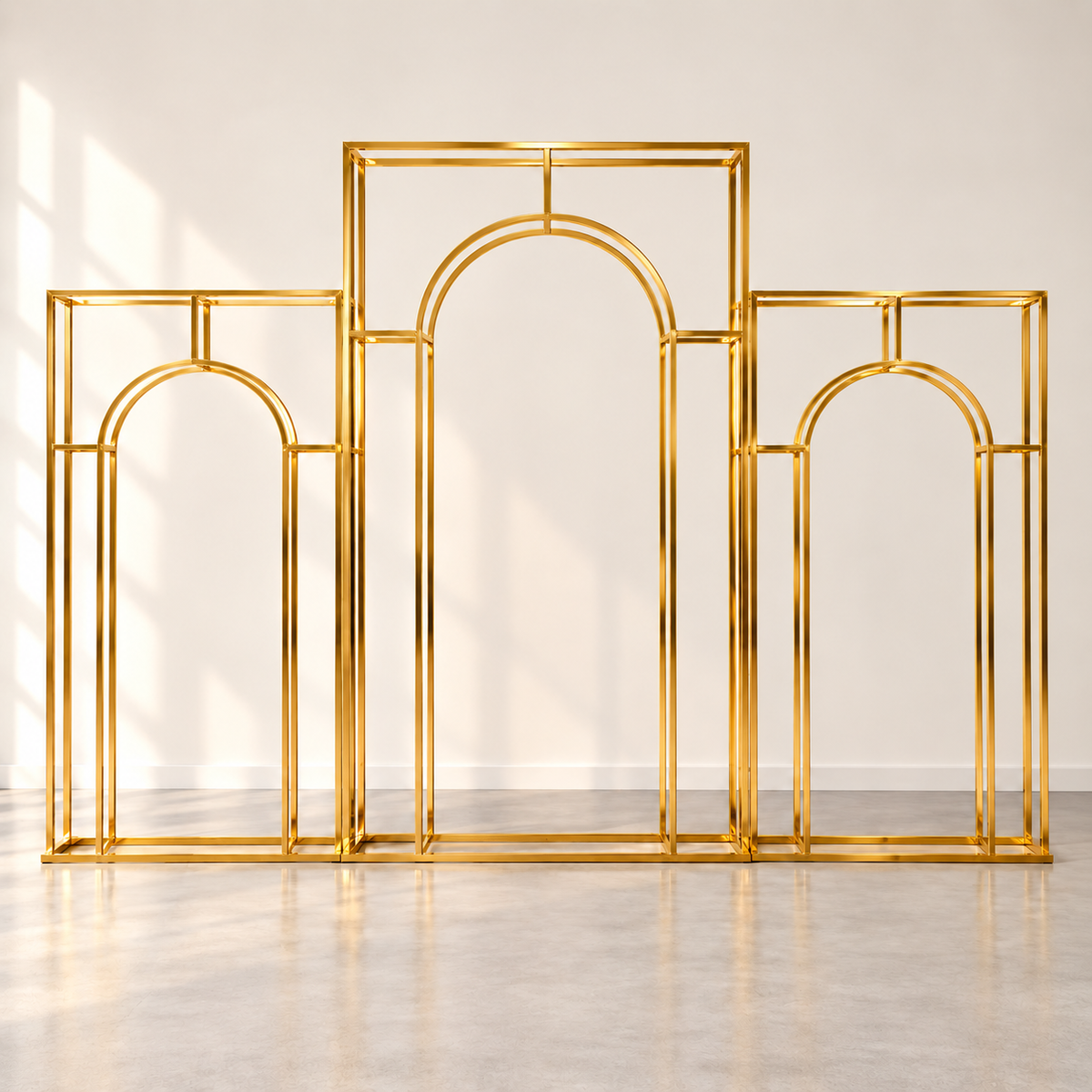 Gold metal wedding arch backdrop set of 3 for floral and balloon event décor rental in Ottawa