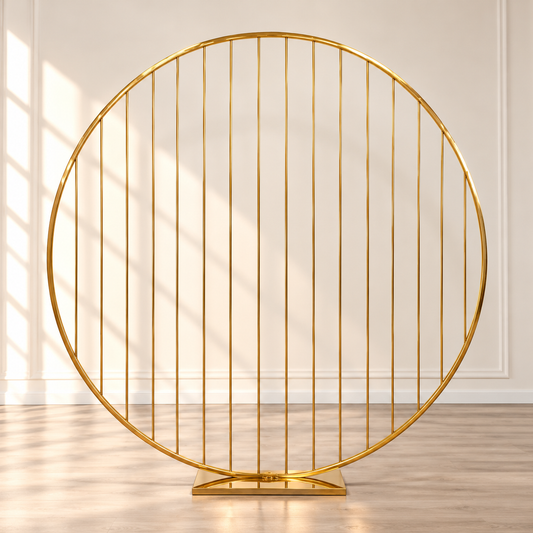 Gold round metal backdrop frame with vertical bars, 6.6 ft diameter, available for wedding and event rentals in Ottawa